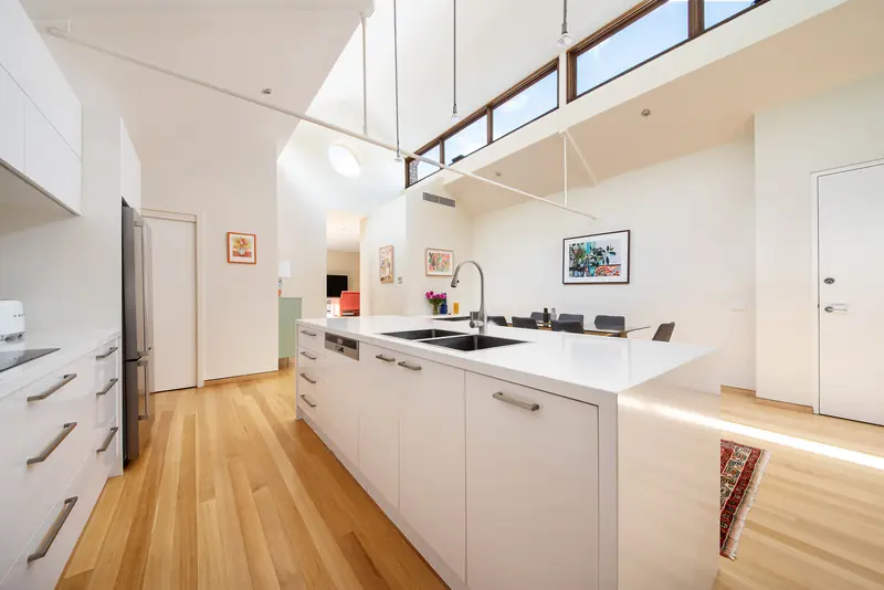 Kitchen bench and sink beneath the clerestory windows