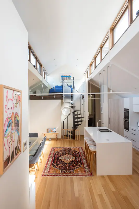 Looking down to the kitchen island from the mezzanine