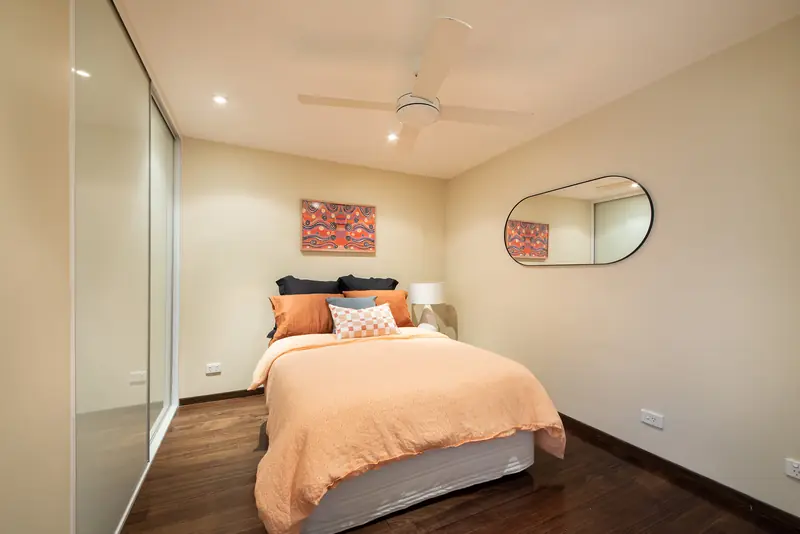 Second bedroom with mirrored built-in robes